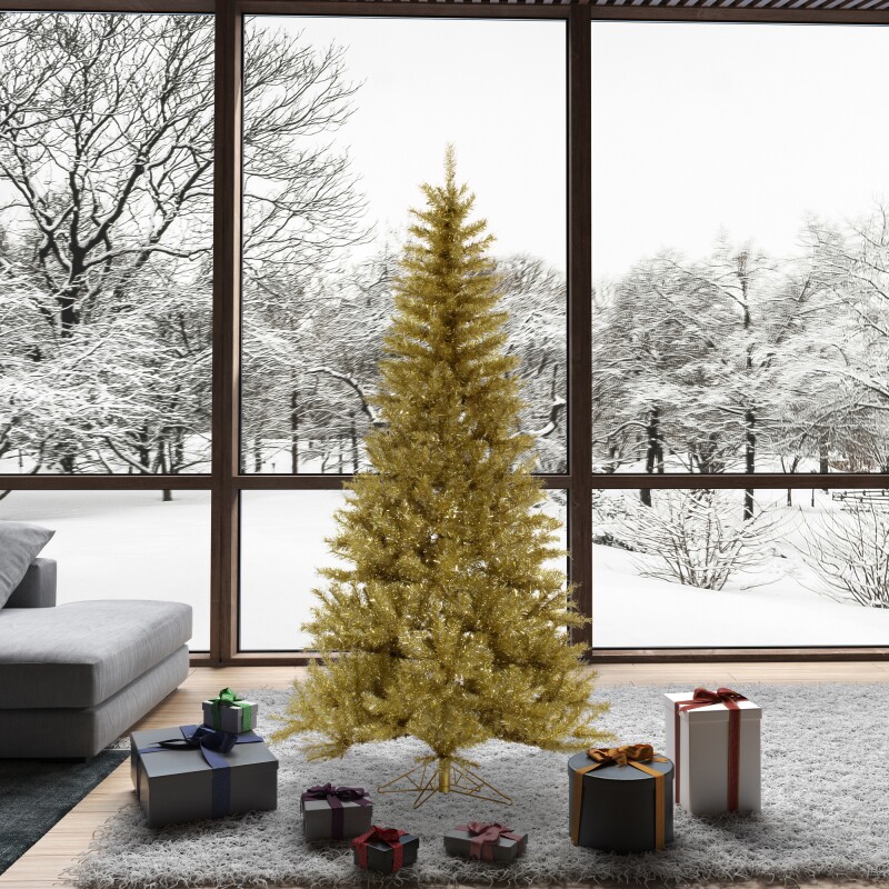 Gold tinsel tree set against large picture window over-looking snow-covered landscape.