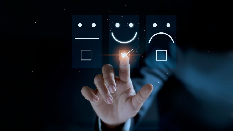Finger of businessman touching and check mark icon face emoticon smile on dark background, service mind, service rating. Satisfaction and customer service concept