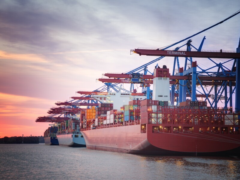 Germany, Hamburg, Port of Hamburg, Harbour, container ship in the evening