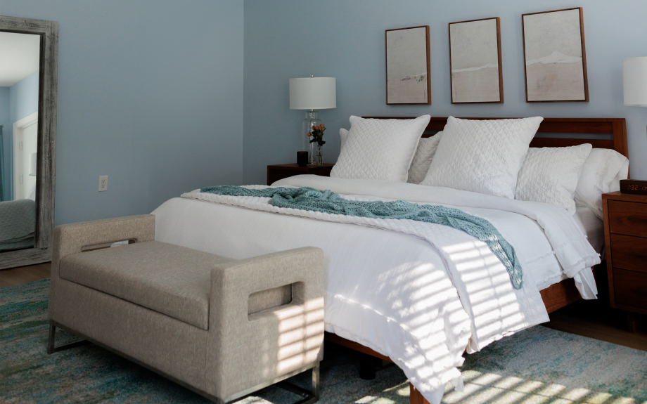 Rebecca's bedroom which features a bench to allow her a comfortable place to sit.